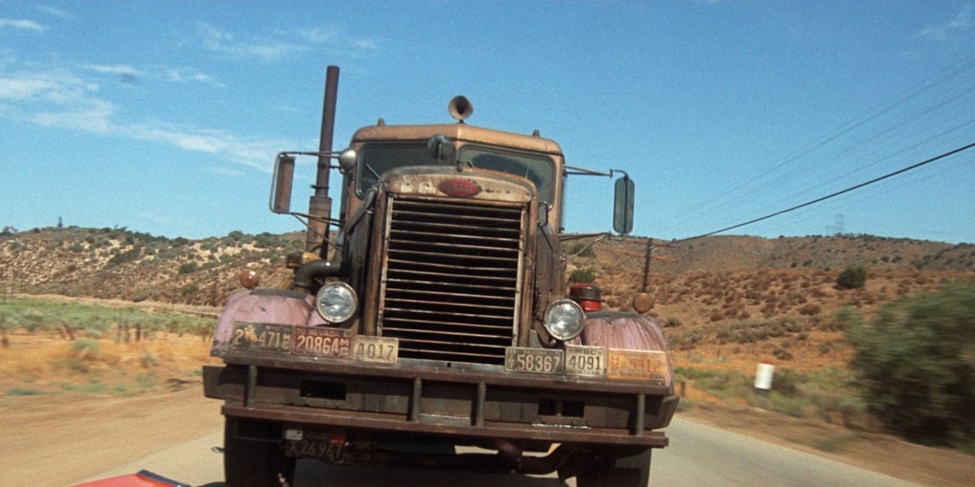 An image of a truck speeding down the street in Duel