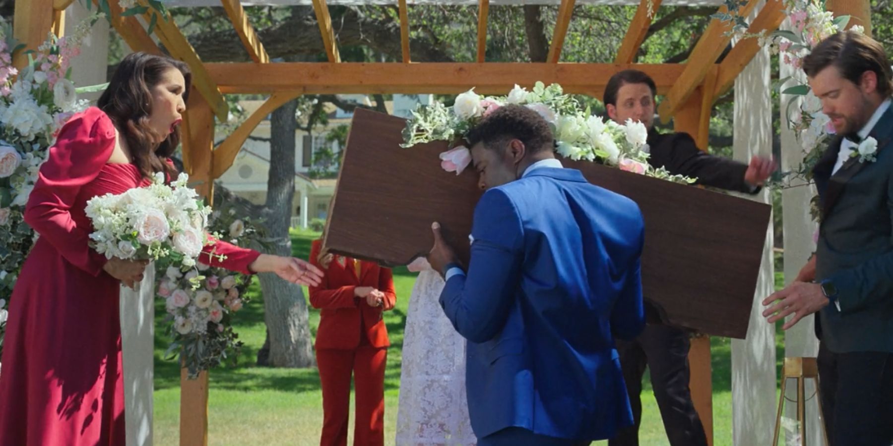 Aniq lifts the vox box onto Edgar and Grace in The Afterparty season 2, episode 1
