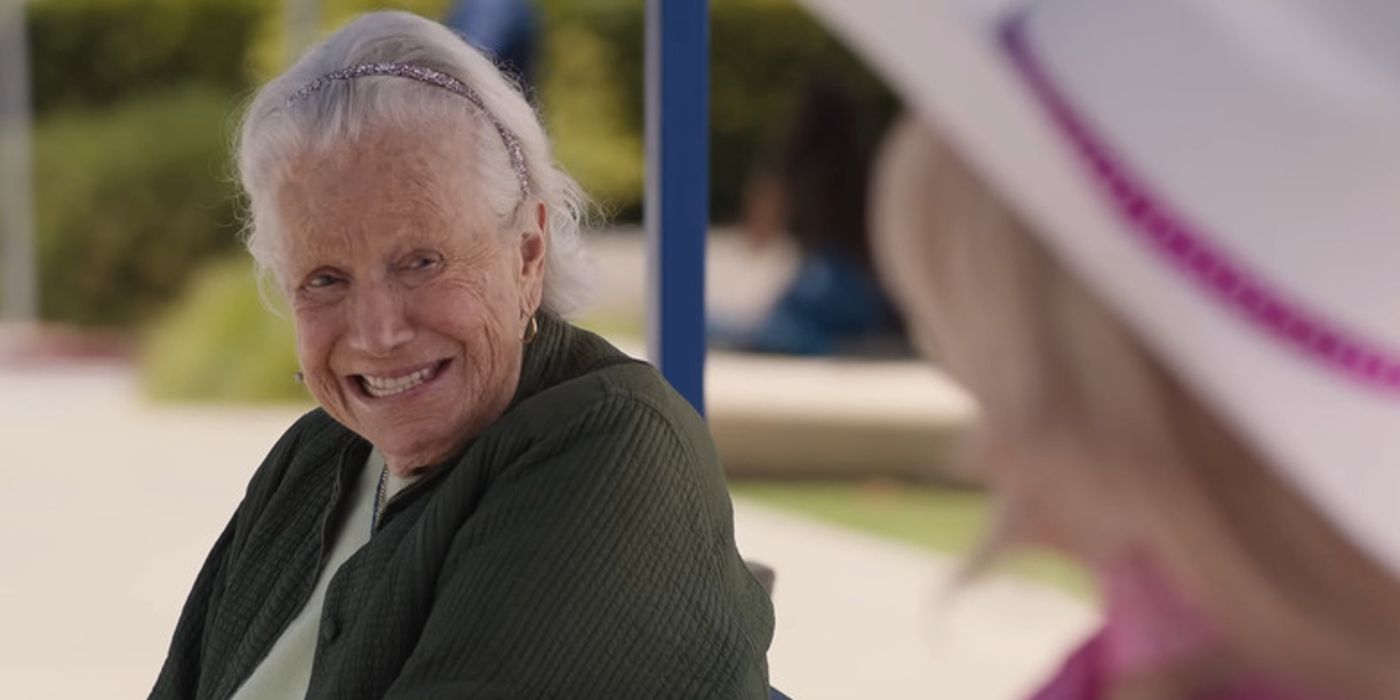 Ann Roth talking with Barbie on a bench