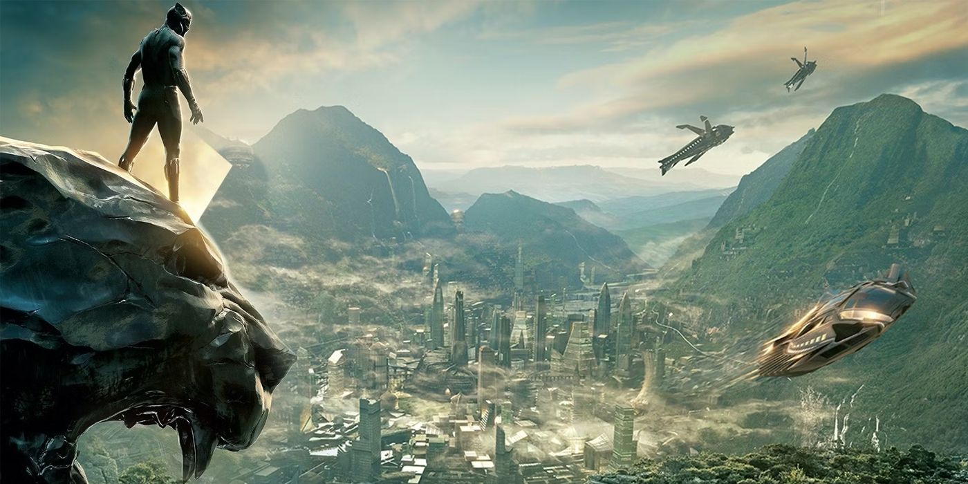 Black Panther stands atop a panther statue looking at Wakanda