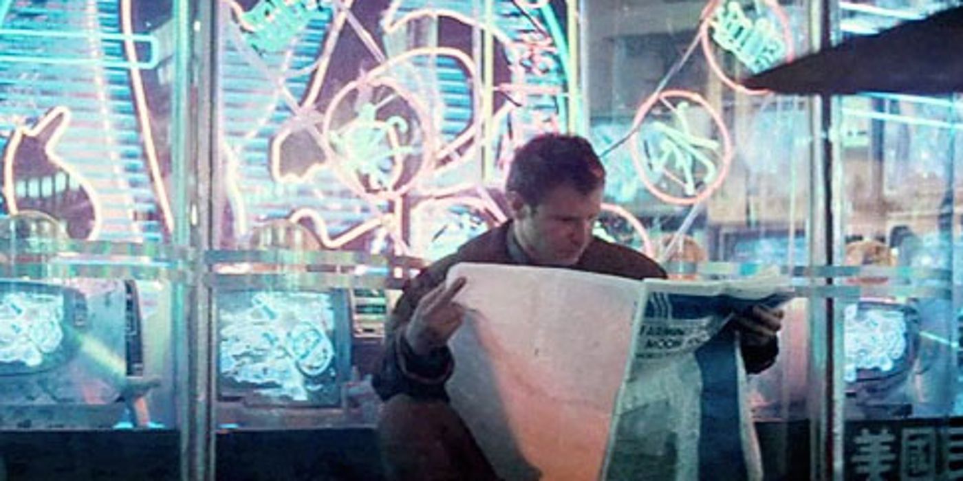 Blade-Runner-Deckard-reading-a-paper