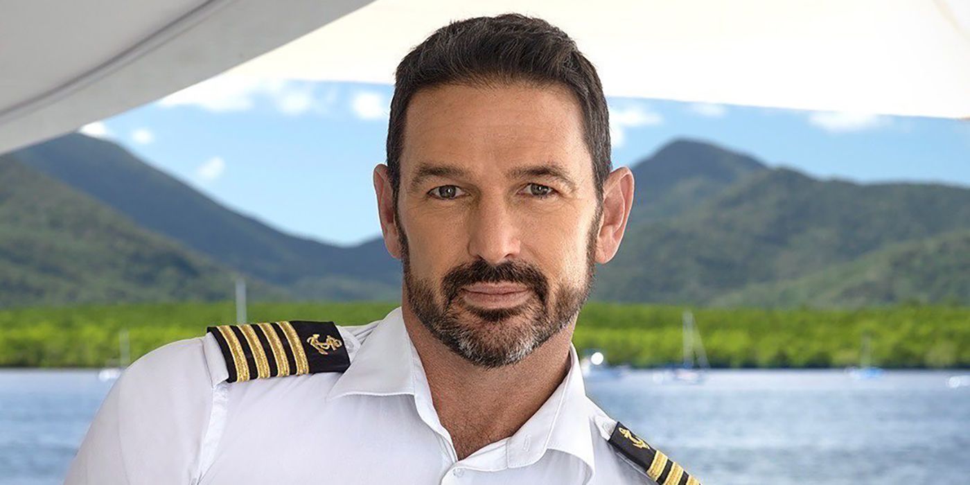 Captain Jason Chambers from Below Deck Down Under on a yacht in the water