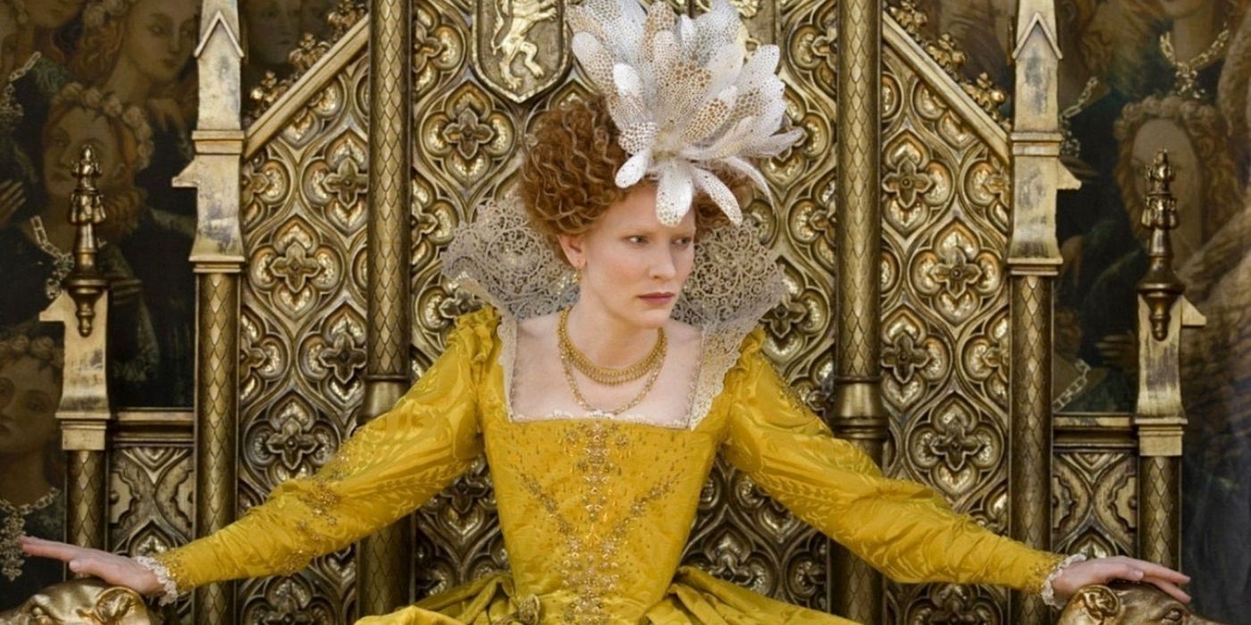 Cate Blanchett as Queen Elizabeth I sitting on a gold throne in a yellow gown in Elizabeth: The Golden Age.