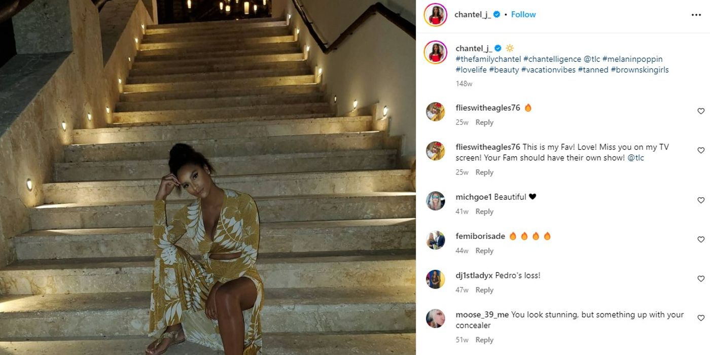 Chantel Everett from The Family Chantel sitting on stairs wearing dress