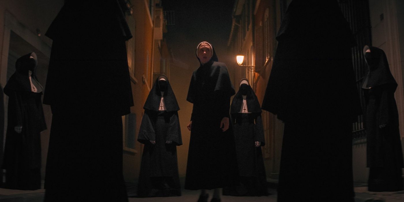 Sister Irene surrounded by nun habits in The Nun 2