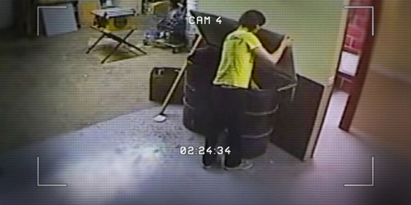 Surveillance camera footage in Don't F**k with Cats of a man putting something in a garbage can.