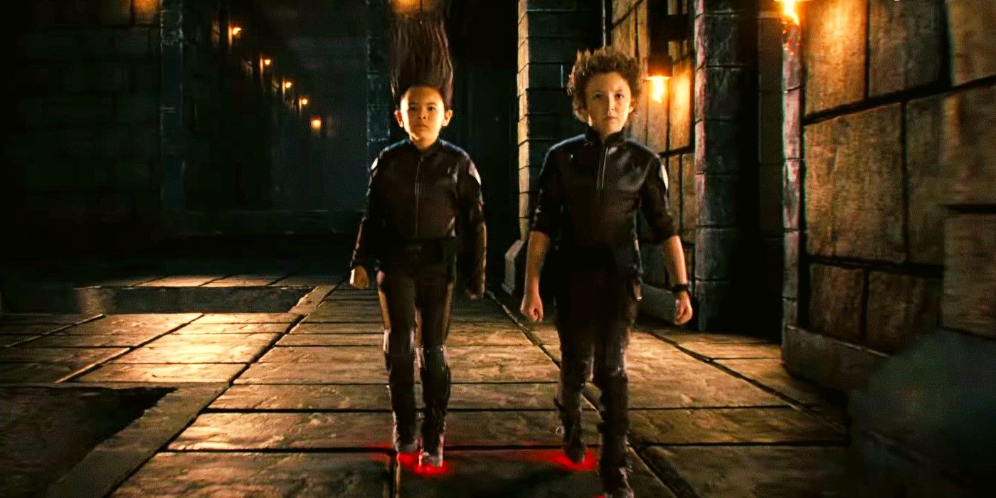 Everly Carganilla and Connor Esterson walking on the ceiling in Spy Kids Armageddon