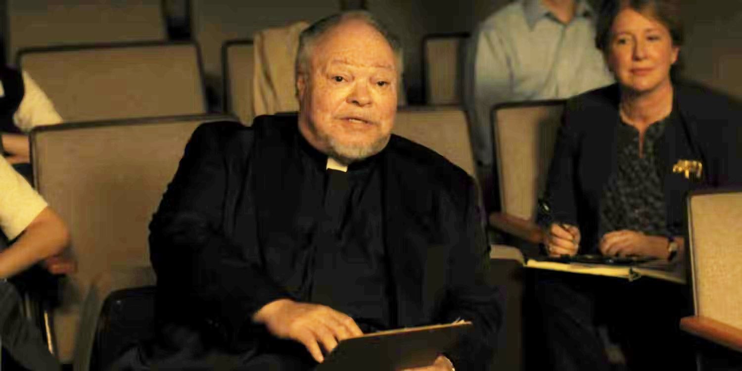 Father Leviatch in the auditorium in Lady Bird