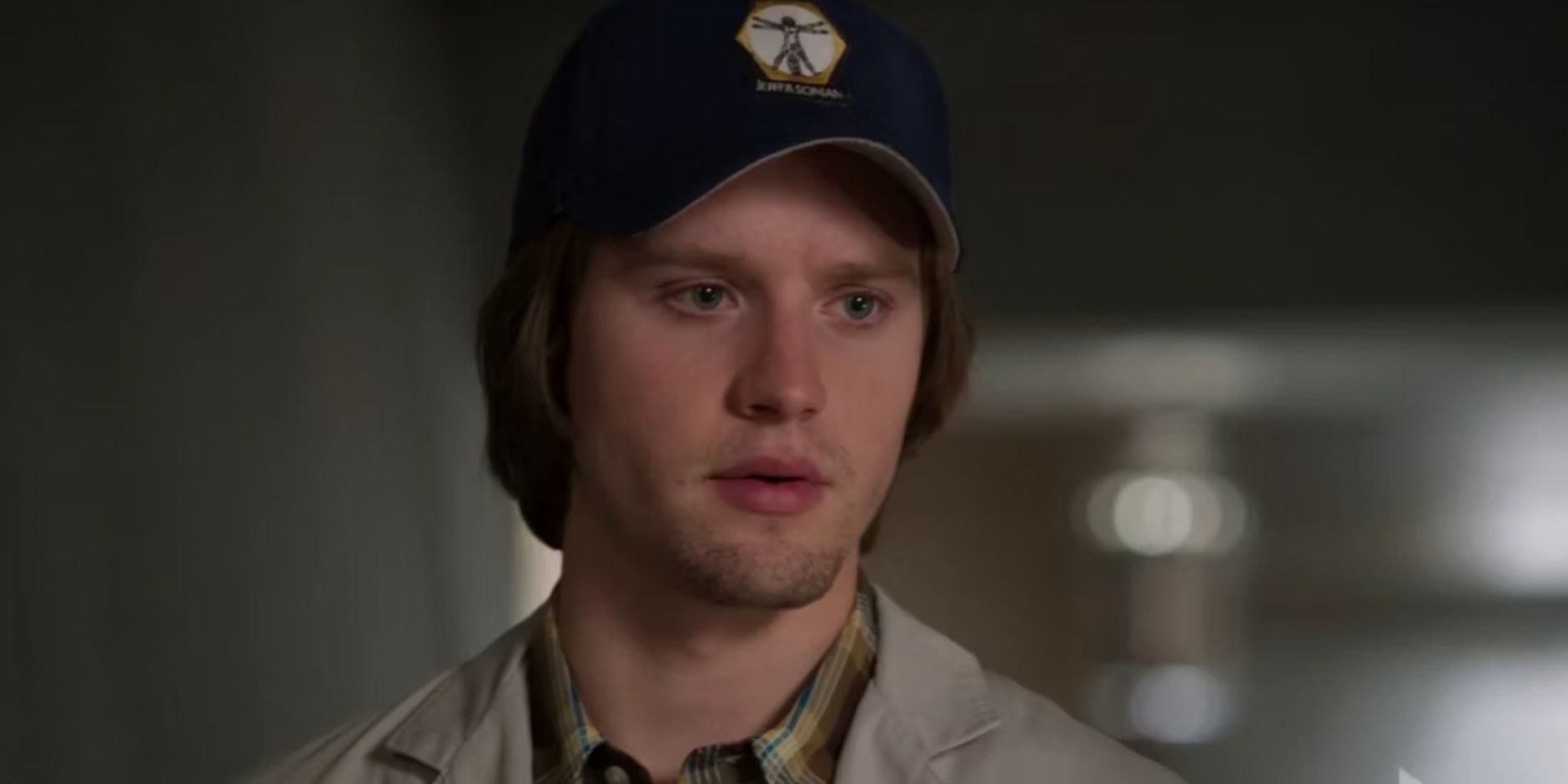 Finn Abernathy wearing a cap in the lab in Bones
