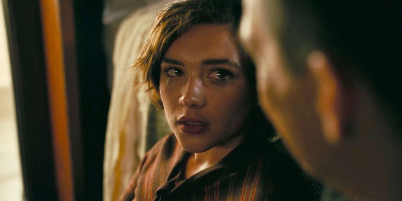 Florence Pugh crying as Jean Tatlock in Oppenheimer. 