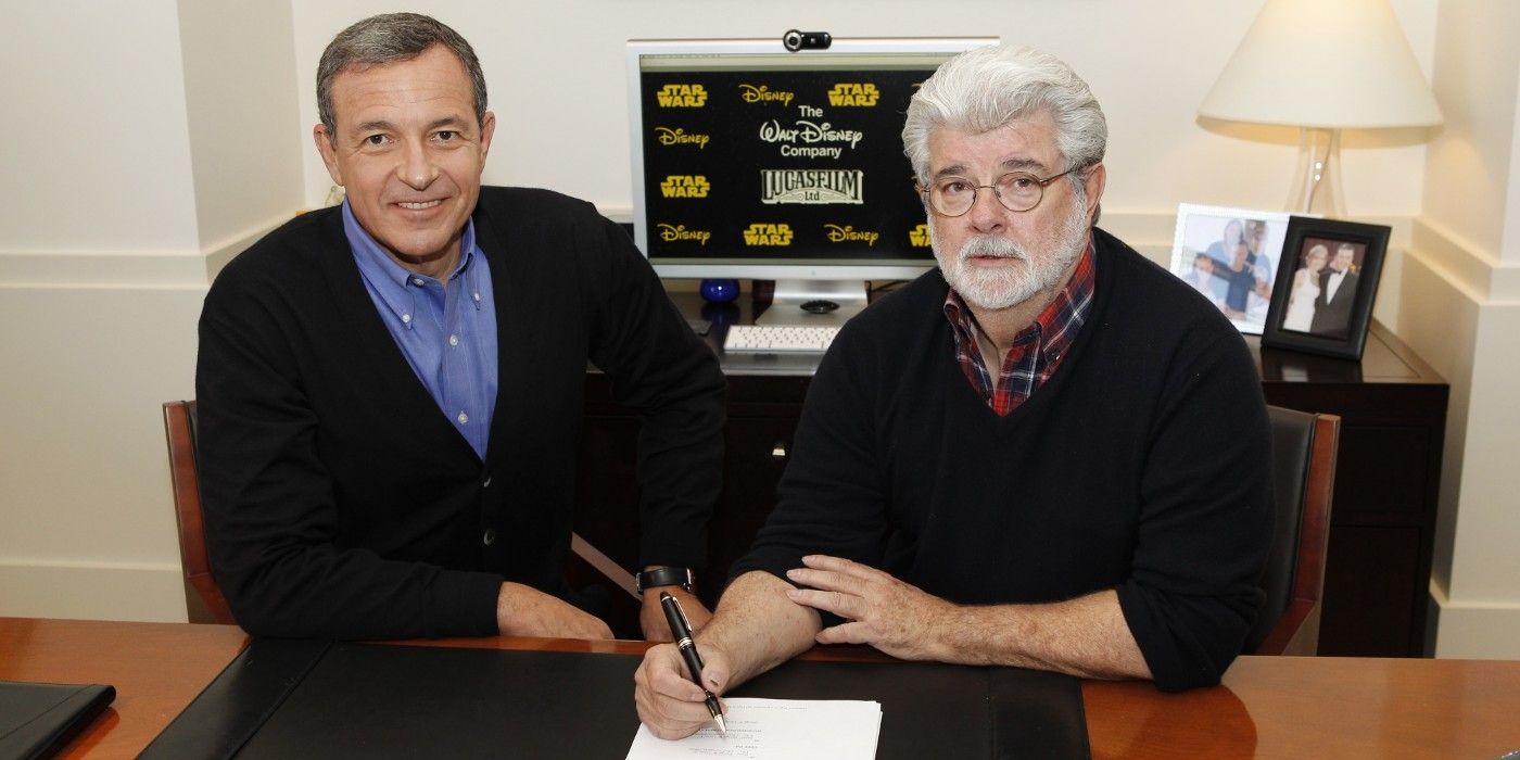 George Lucas and Bob Iger as Disney acquires Lucasfilm in 2012.