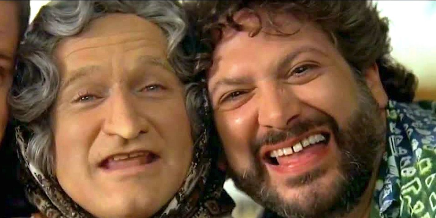 Harvey Fierstein and Robin Williams singing and smiling in Mrs. Doubtfire