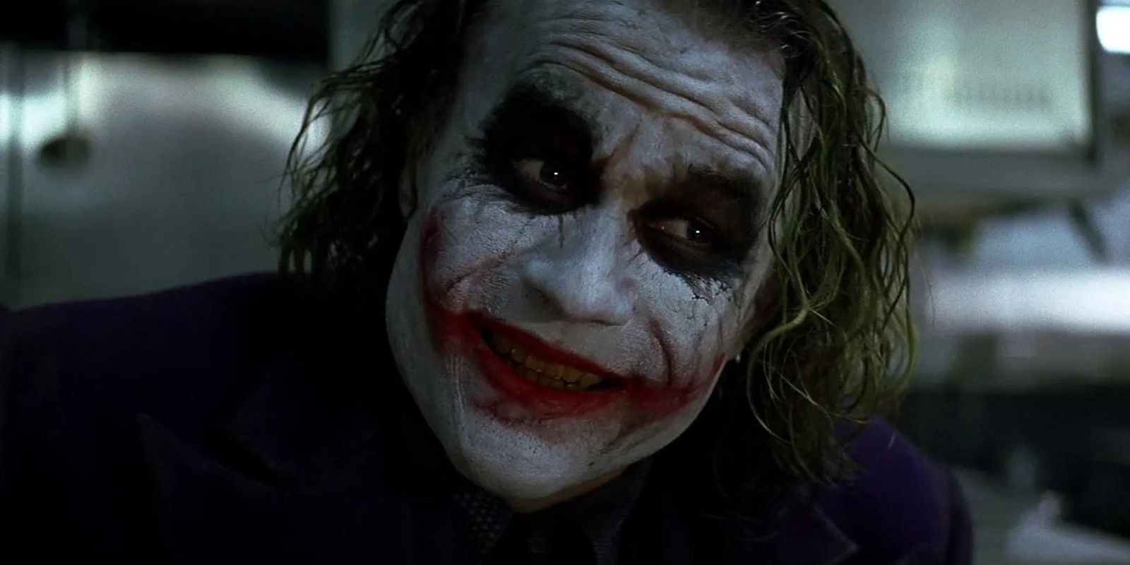 Heath Ledger smiling in The Dark Knight