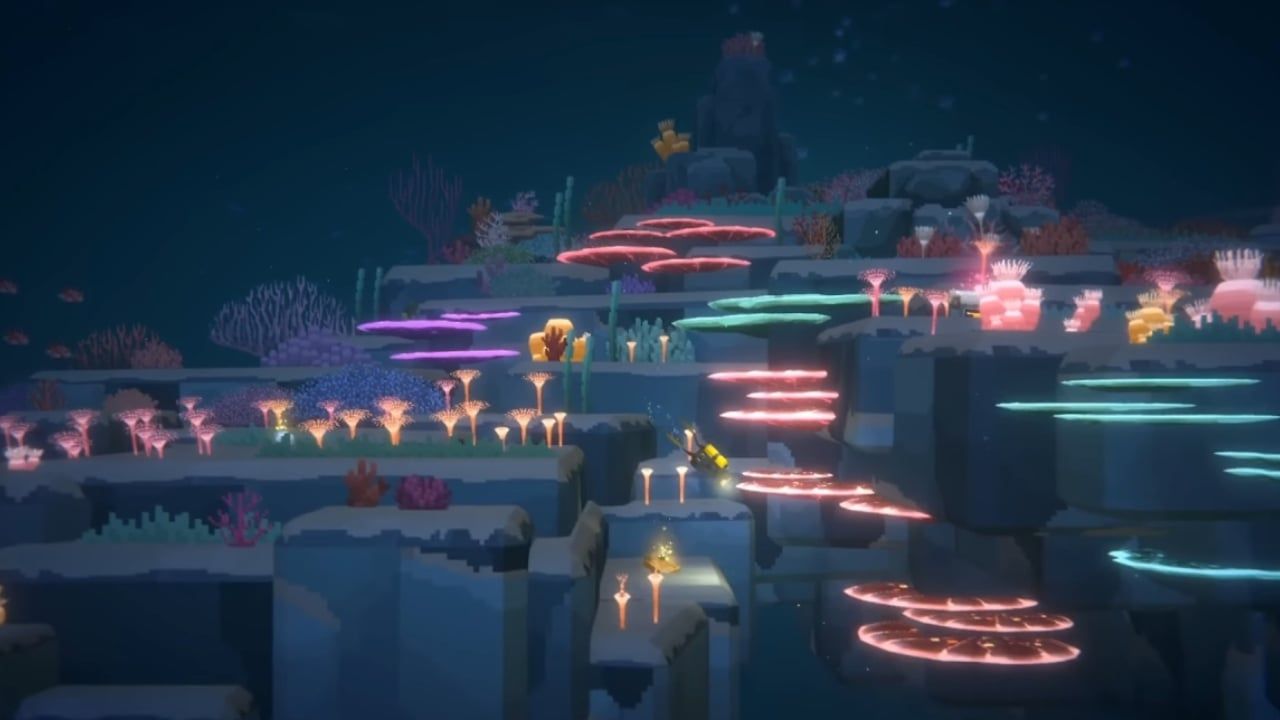 Dave dives at night through the ocean alongside colorful glowing coral.