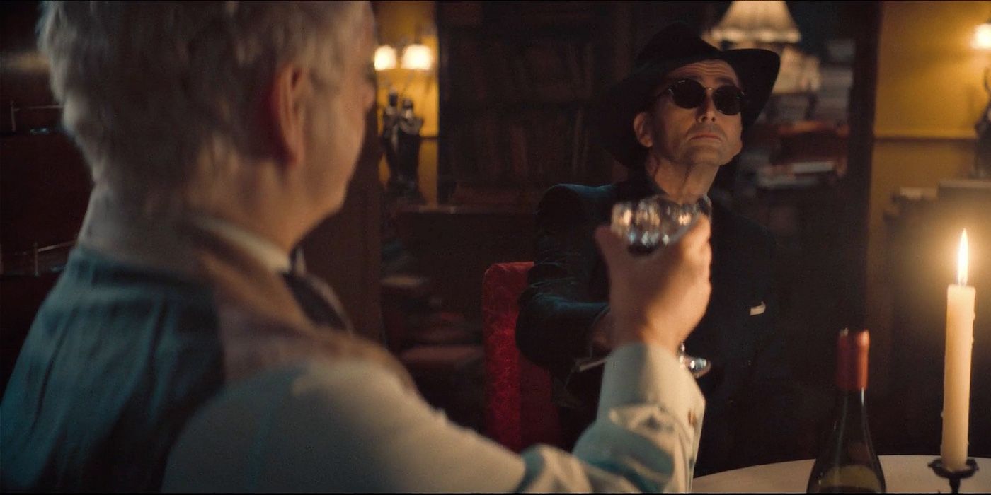 Good Omens season 2: Aziraphale clinking glasses with Crowley