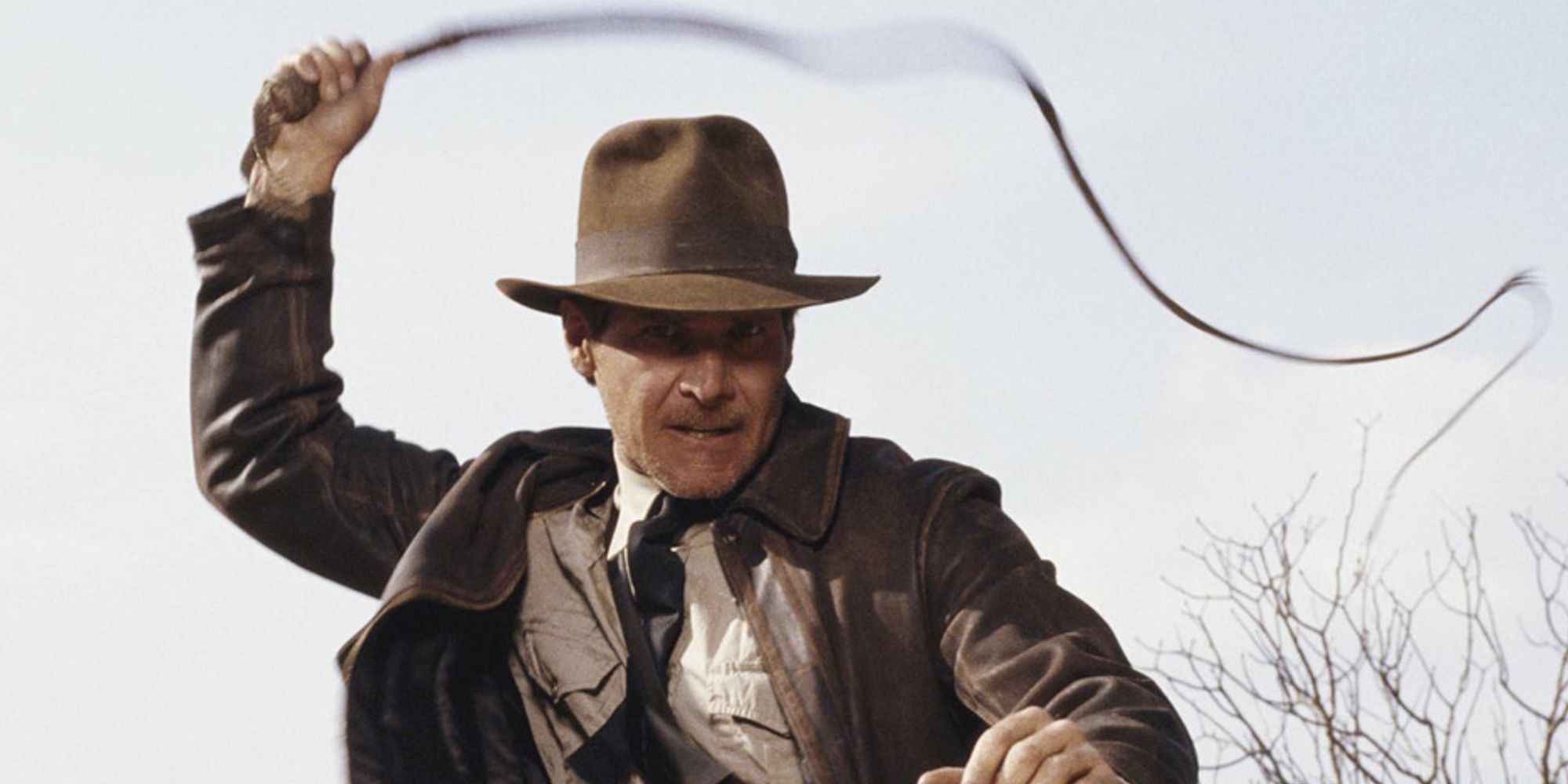 Harrison Ford as Indy using his whip in Indiana Jones and the Last Crusade 