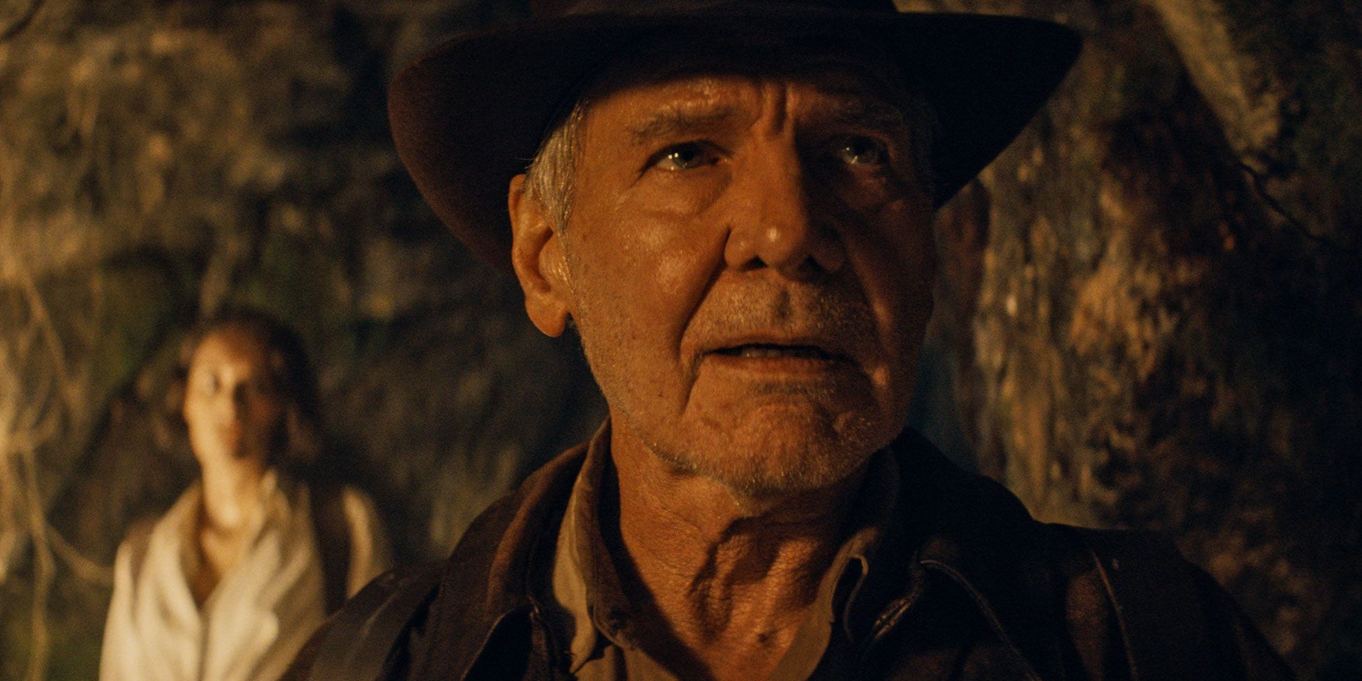 Indy enters a cave in Indiana Jones and the Dial of Destiny