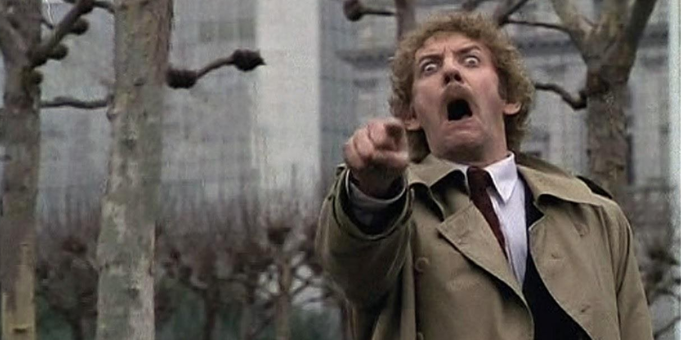 Donald Sutherland pointing and screaming in Invasion Of The Body Snatchers