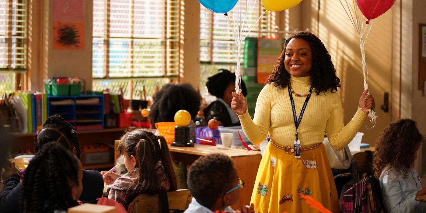 Janine holds balloons in her classroom in Abbott Elementary
