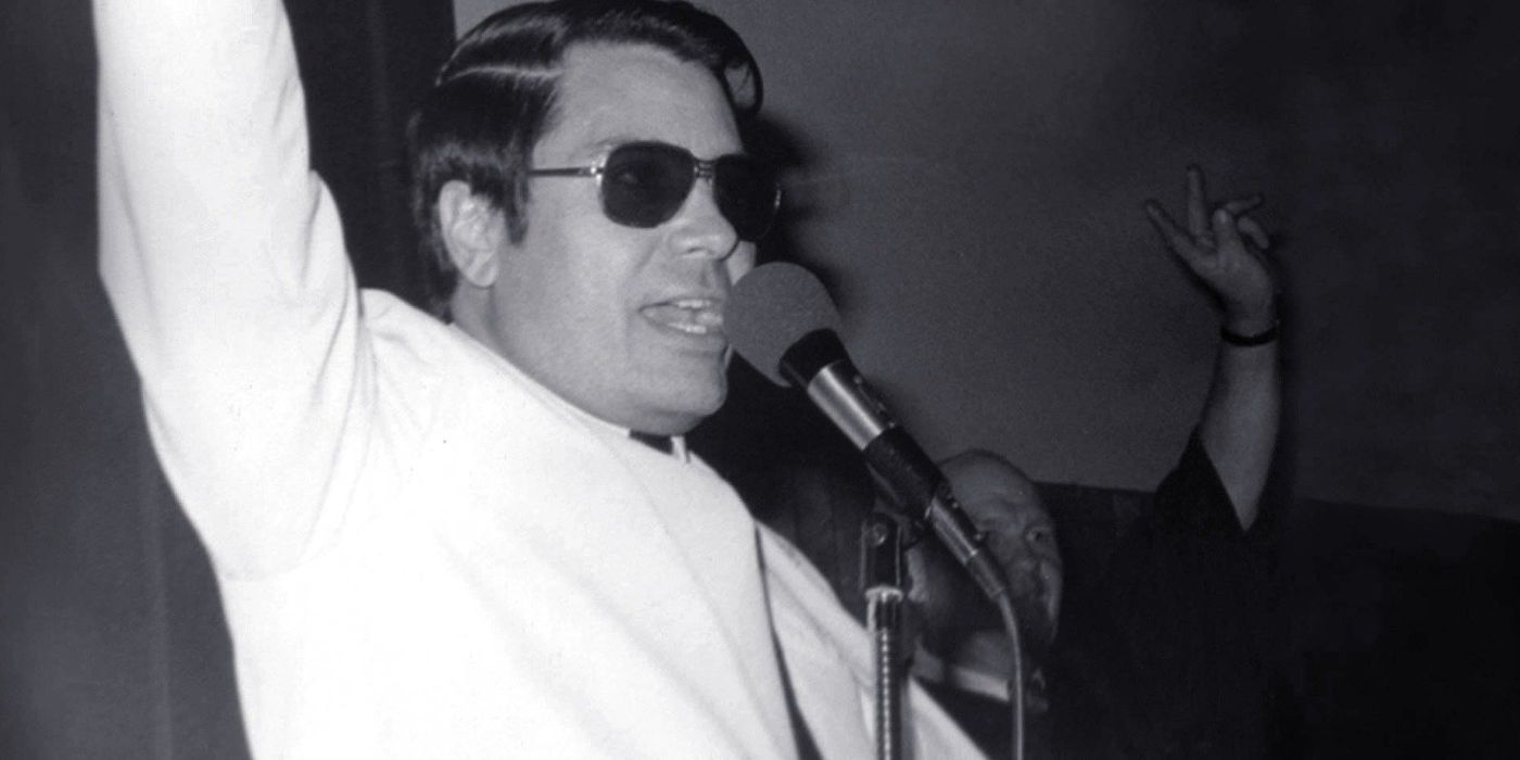 Jim Jones leading a congregation in Jonestown The Life and Death of Peoples Temple.