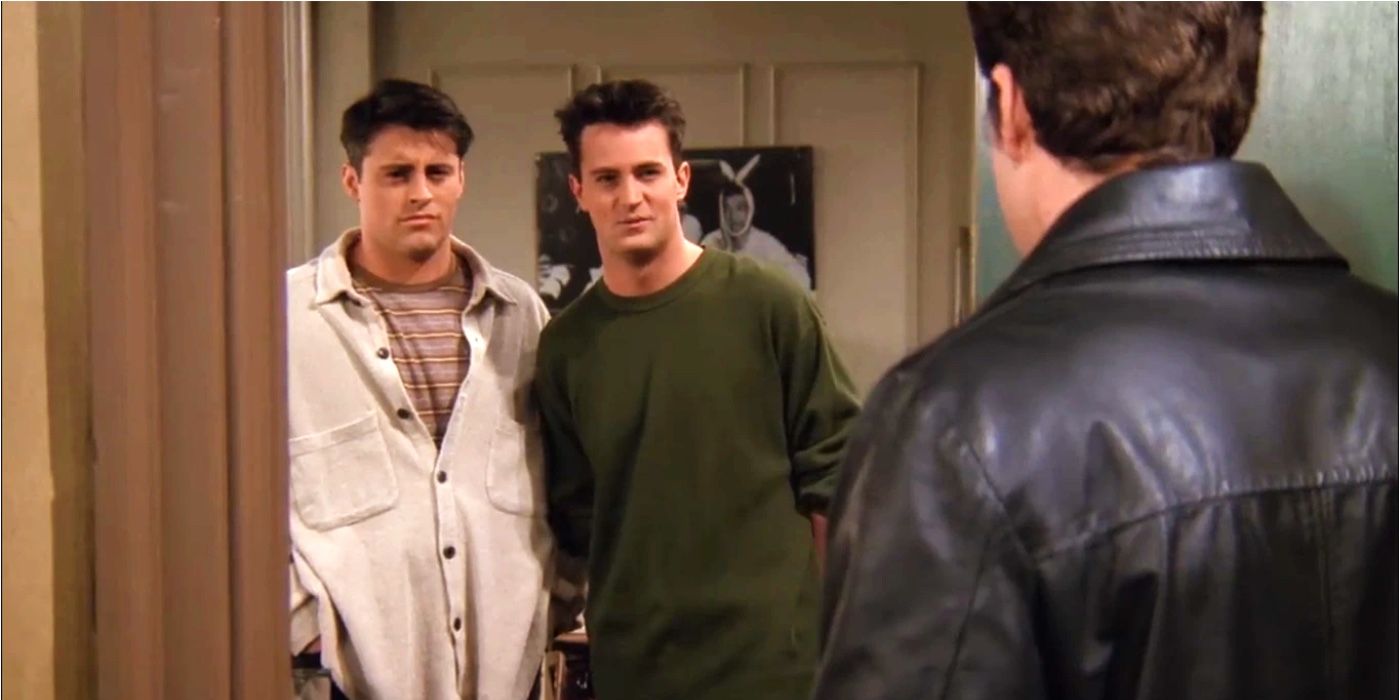 Joey and Chandler staring at Eddie on Friends