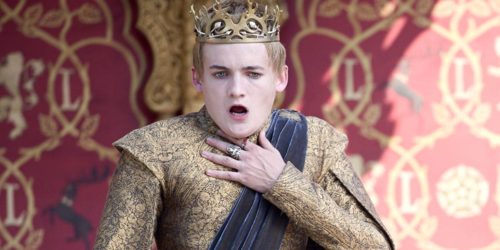 Joffrey holding his throat as he chokes in Game of Thrones