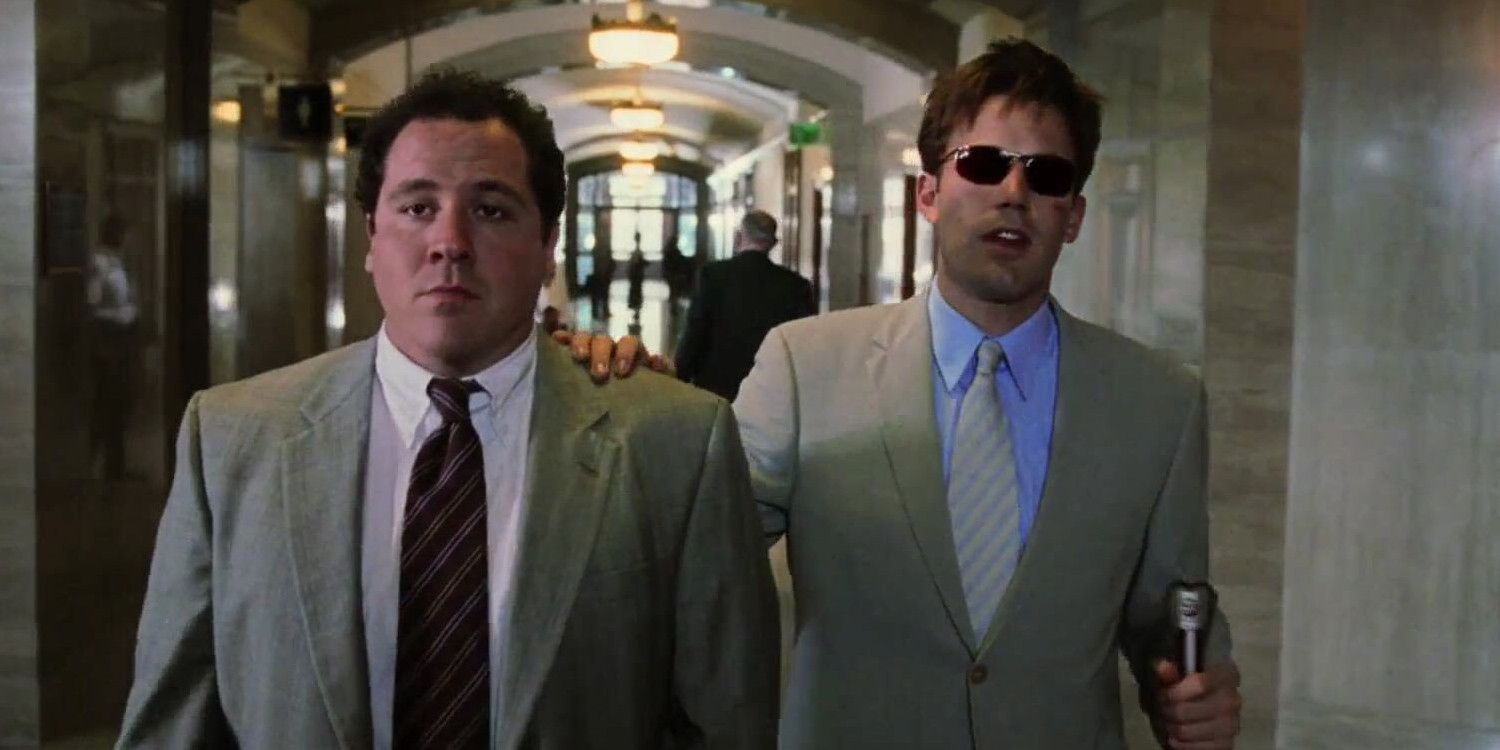 Foggy and Matt Murdock walk through a courthouse in Daredevil (2003)