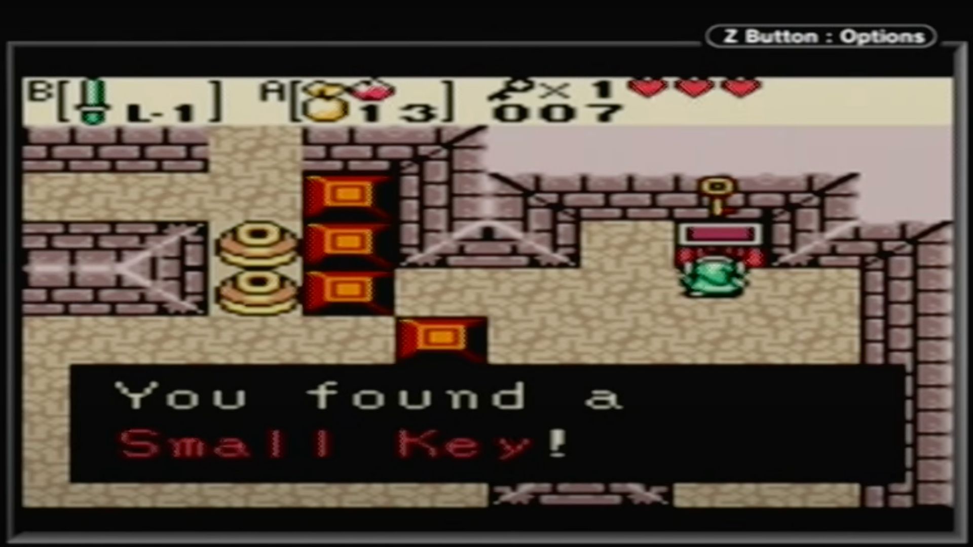 Link collecting a small key in Zelda_ Oracle of Ages