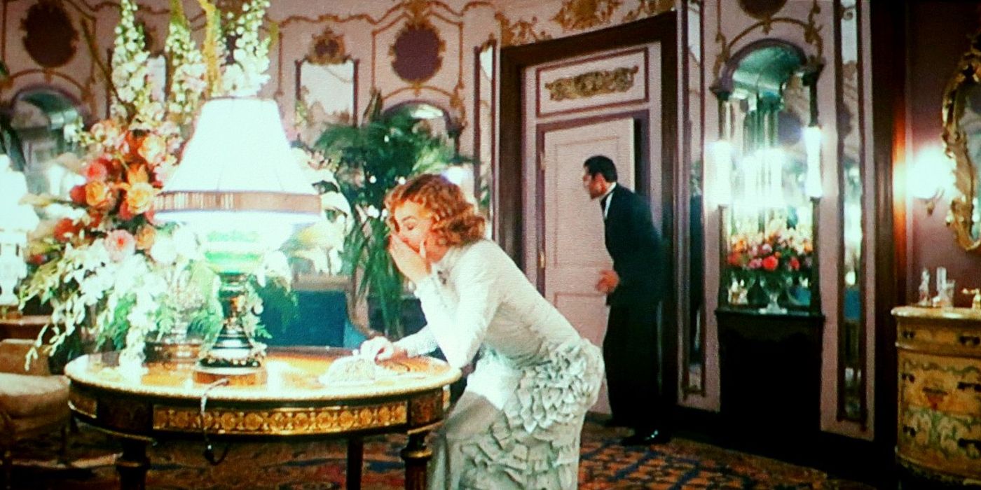 Nellie and Jack walk into a room in William Randolph Hearst&rsquo;s mansion.