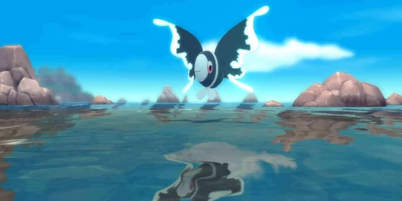 Lumineon from Pokemon, hovering over a body of water with its reflection in the water