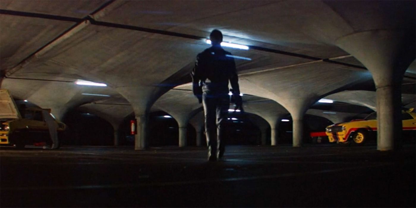 Mad Max walking through a garage in the 1979 movie