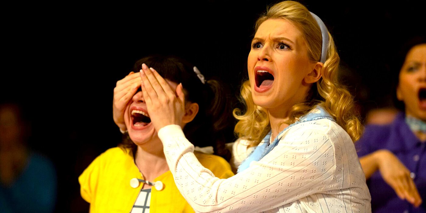 Madison Thompson as Susan St. Clair Screaming and Covering The Eyes of Josette Halpert as Dot in Grease Rise of the Pink Ladies