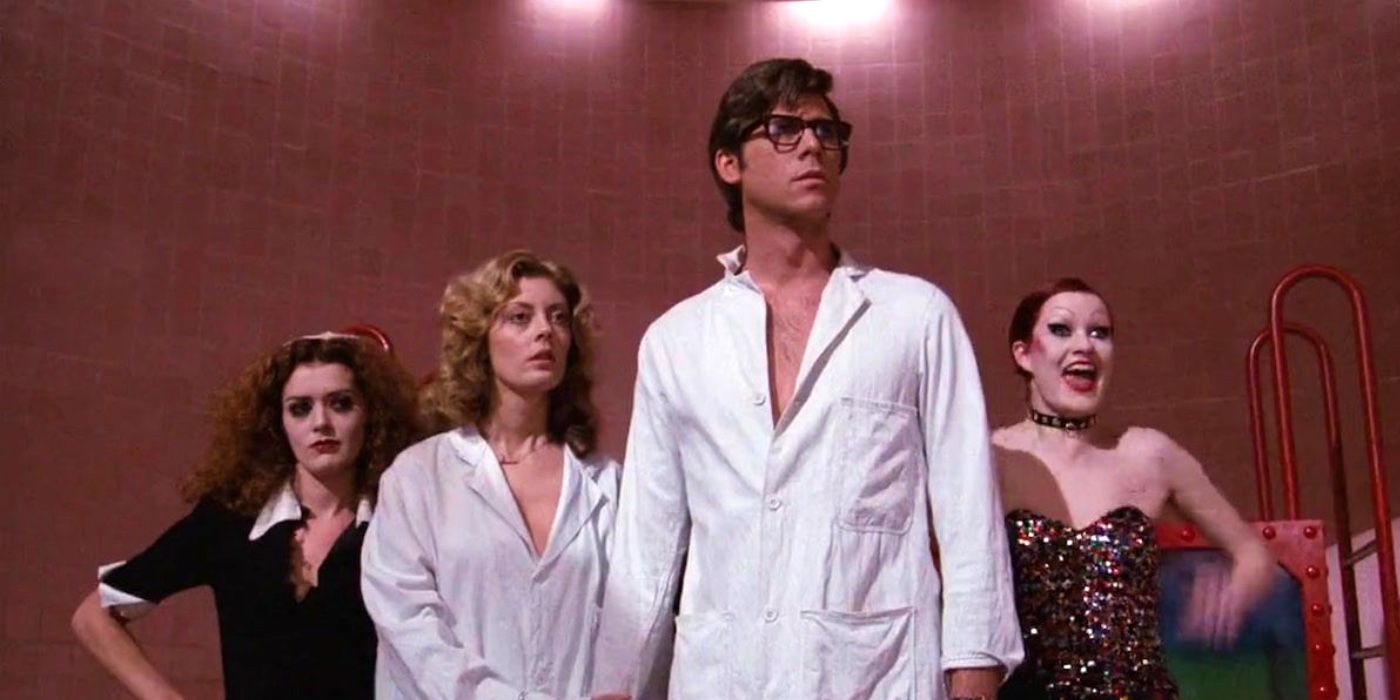 Magenta, Janet, Brad, and Columbia standing together in Rocky Horror