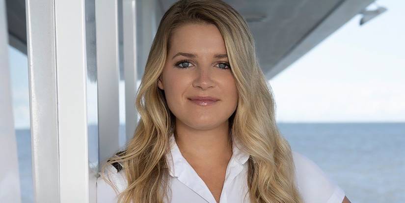 Margot Sisson Below Deck Down Under wearing uniform smiling on deck