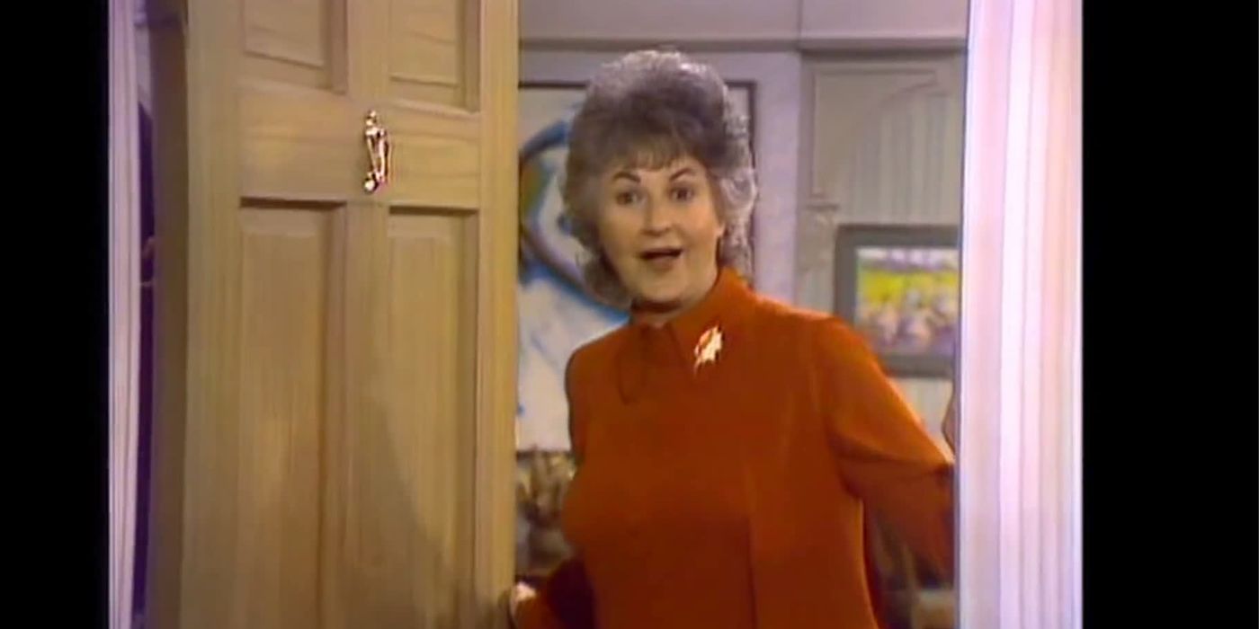 Maude In Front Of The Opened Door