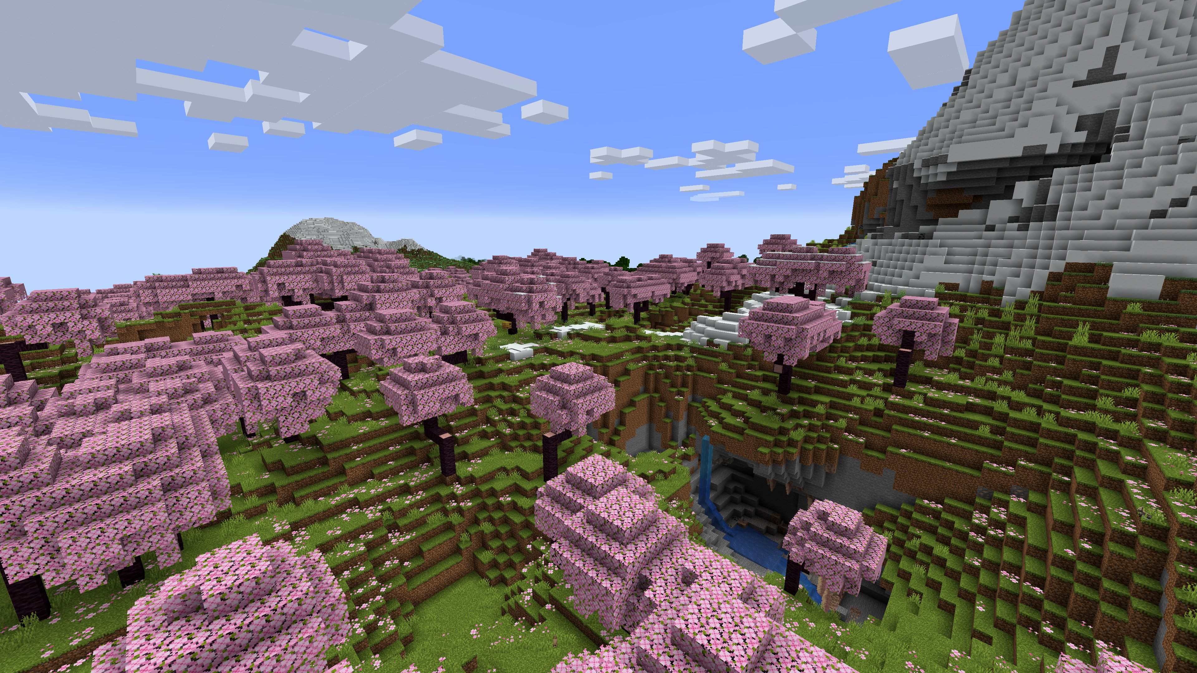 Minecraft 1.20 Semente com Bosque em Flor de Cerejeira na Montanha com Caverna