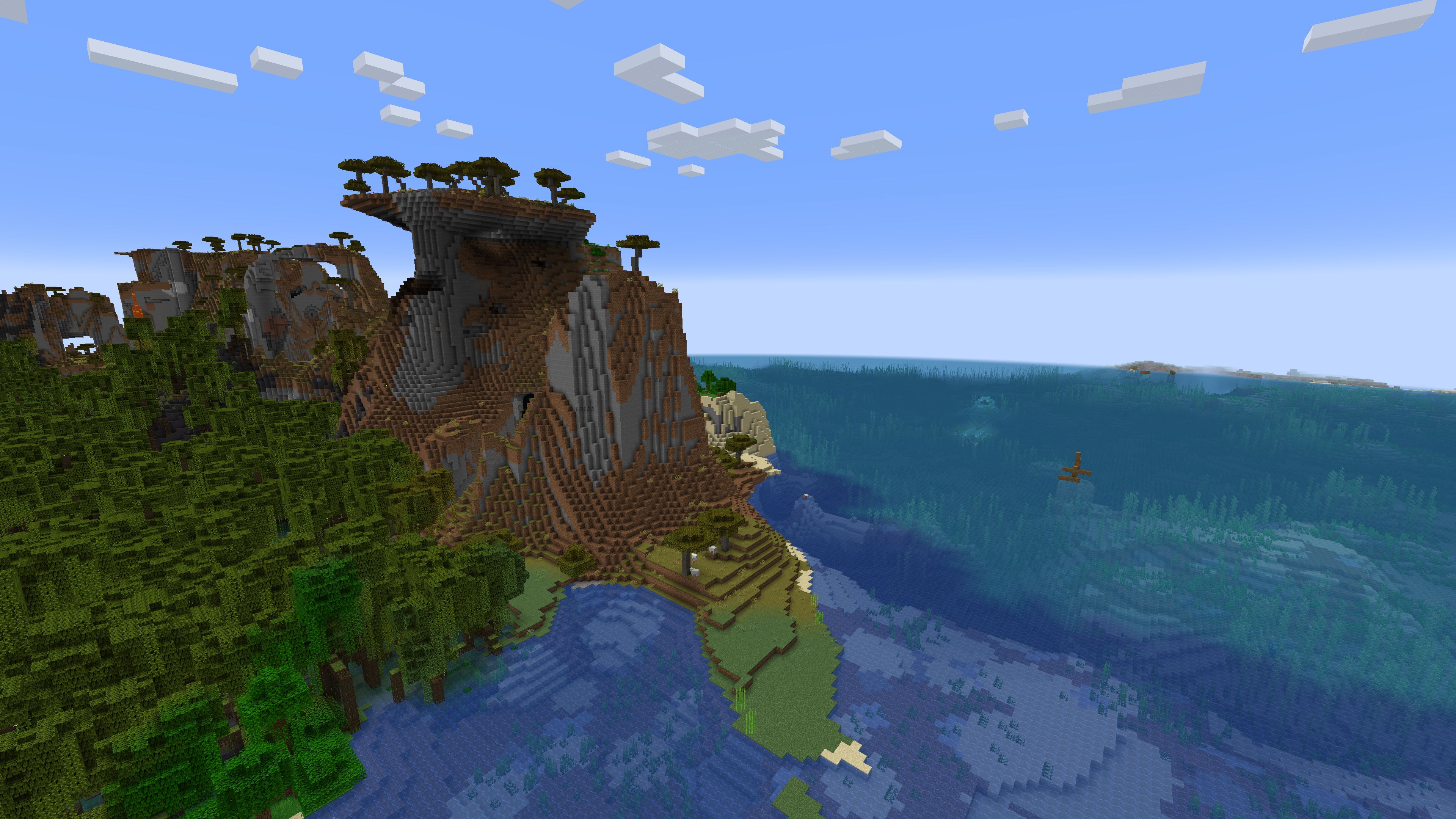 Semilla de Minecraft 1.20 con bioma de manglares, selva y colinas de sabana y monumento oceánico y naufragio en el océano