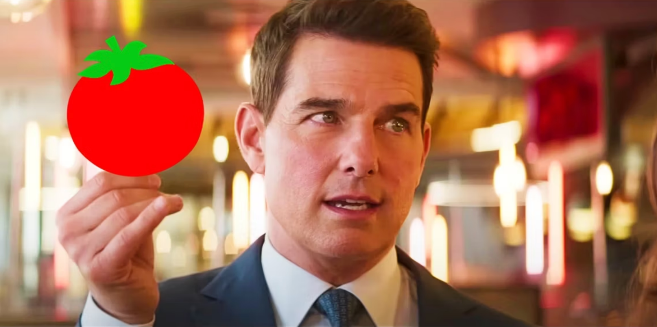 Ethan Hunt holding a fresh tomato in Mission: Impossible – Dead Reckoning Part One