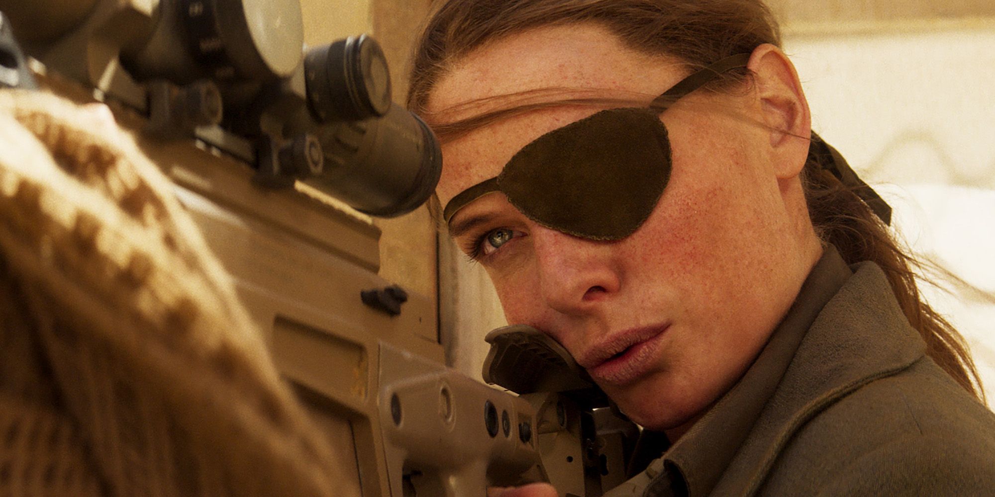 Ilsa wearing an eye patch and looking through a scope in Mission Impossible Dead Reckoning