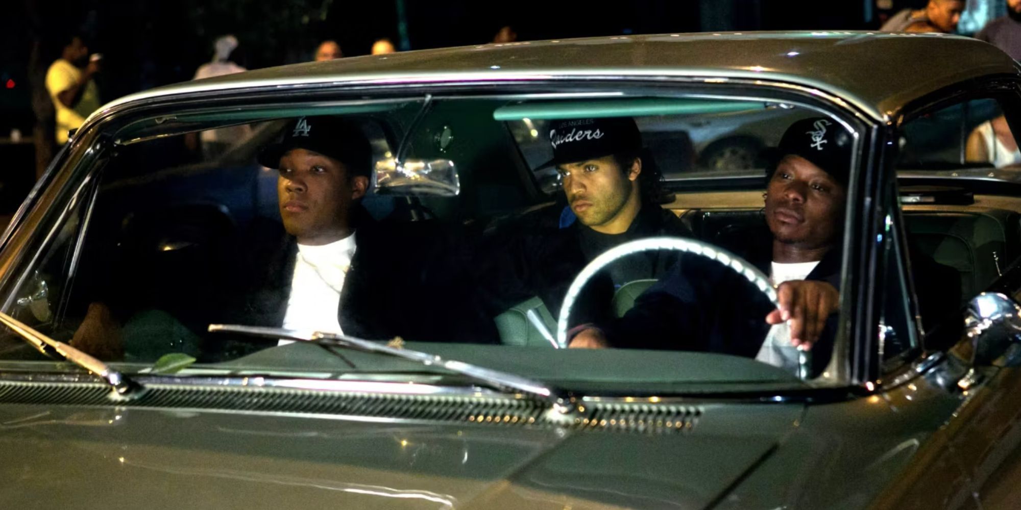 NWA members sitting in a car in Straight Outta Compton
