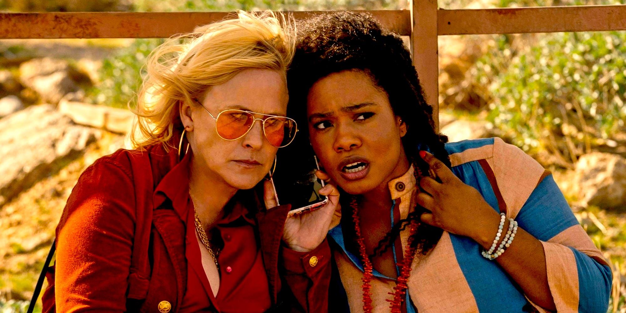 Patricia Arquette and Weruche Opia On the Phone in High Desert