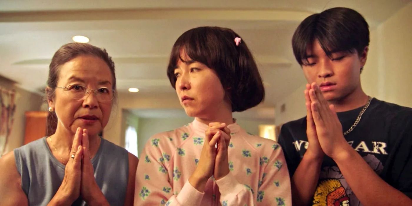 Maya prays with her mom and brother in Pen15