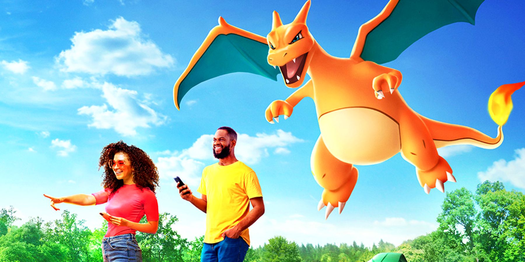 Charizard flying behind two people carrying their phones, playing Pokémon GO.