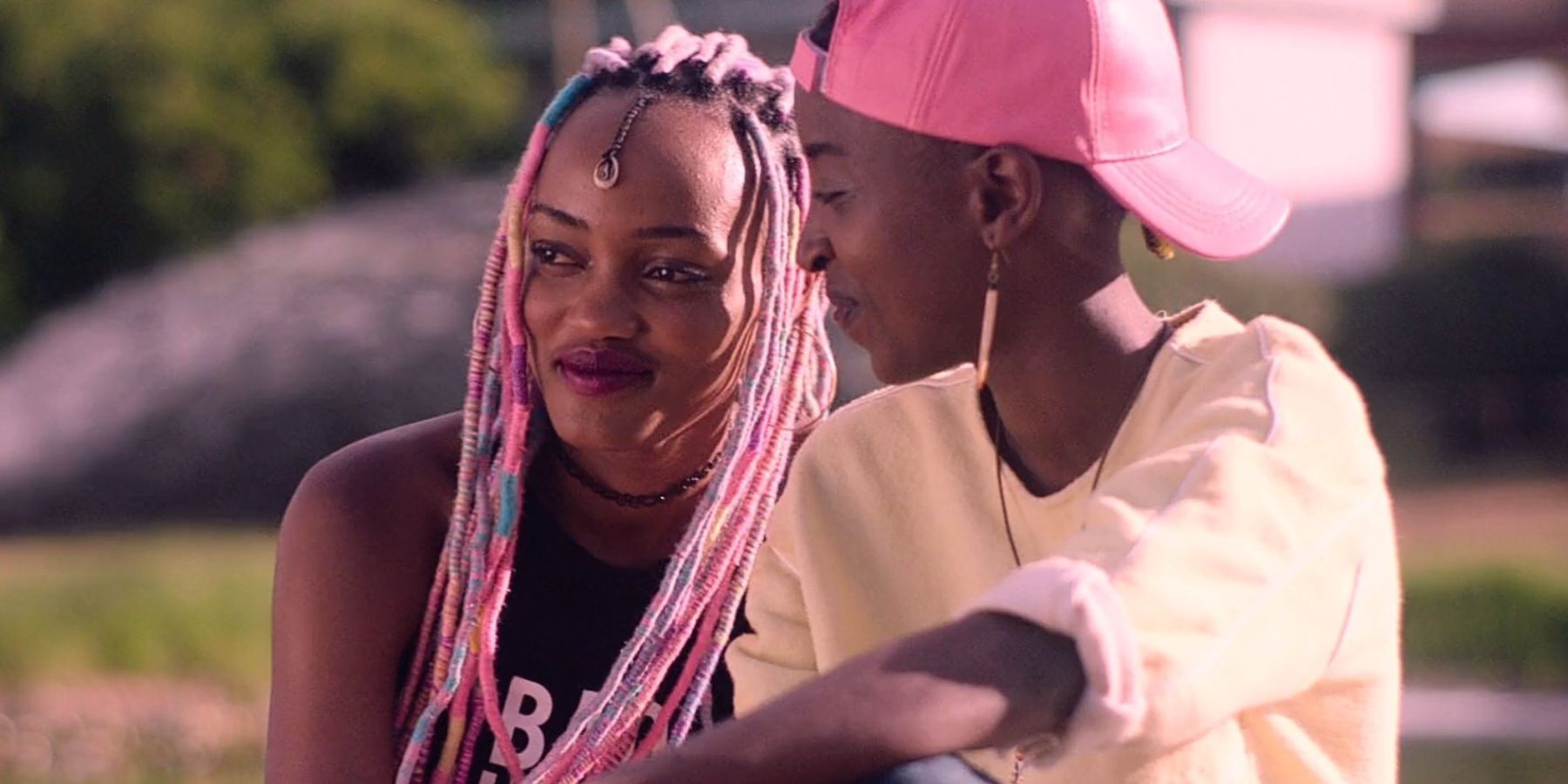 Rafiki movie, smiling outside