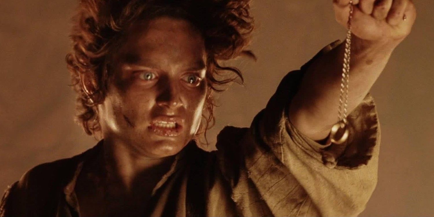Frodo holds the One Ring over the fires of Mt. Doom in The Lord of the Rings: The Return of the King.