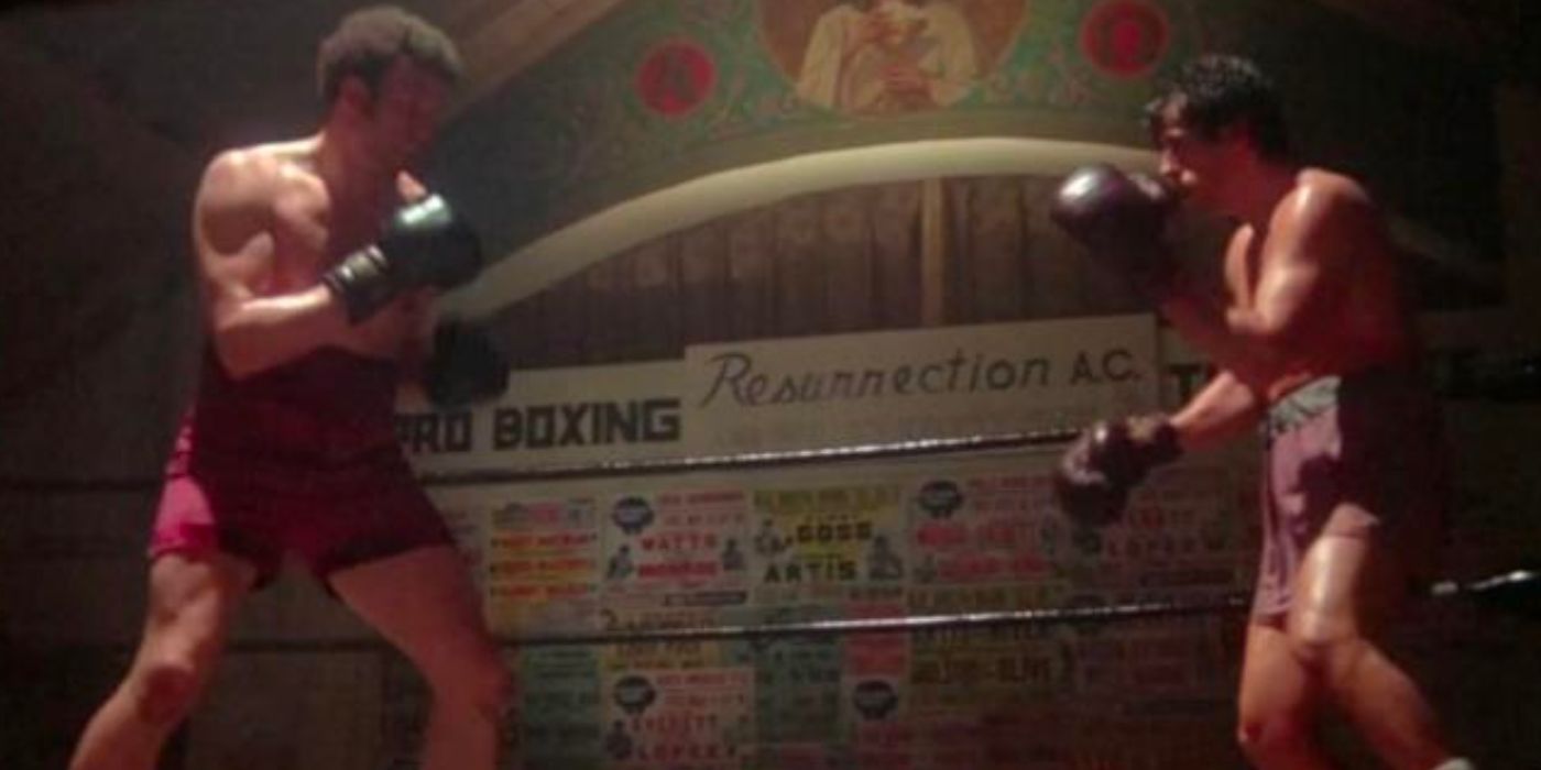 Rocky Balboa fighting Spider Rico in his first fight in the boxing ring