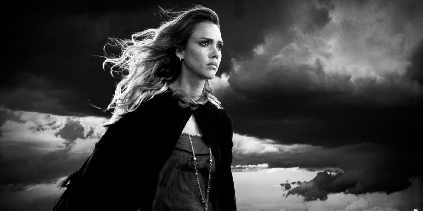 Jessica Alba walks against a cloudy sky in Sin City