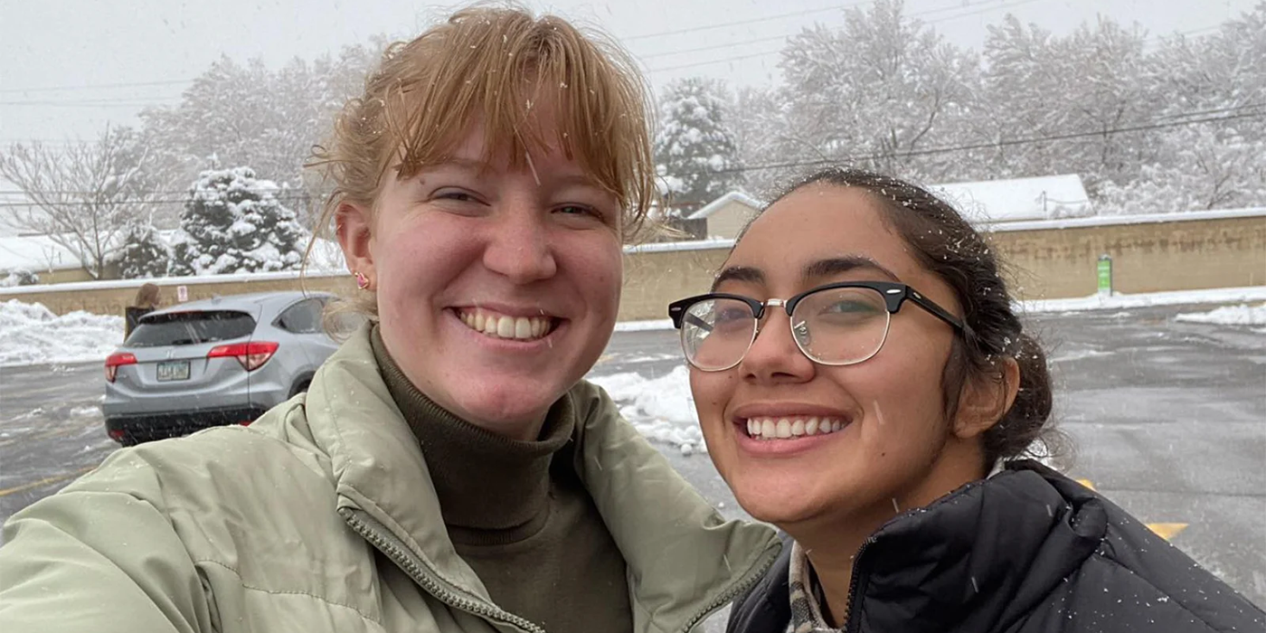Sister Wives Gwendlyn Brown and Beatriz Queiroz smiling in the snow