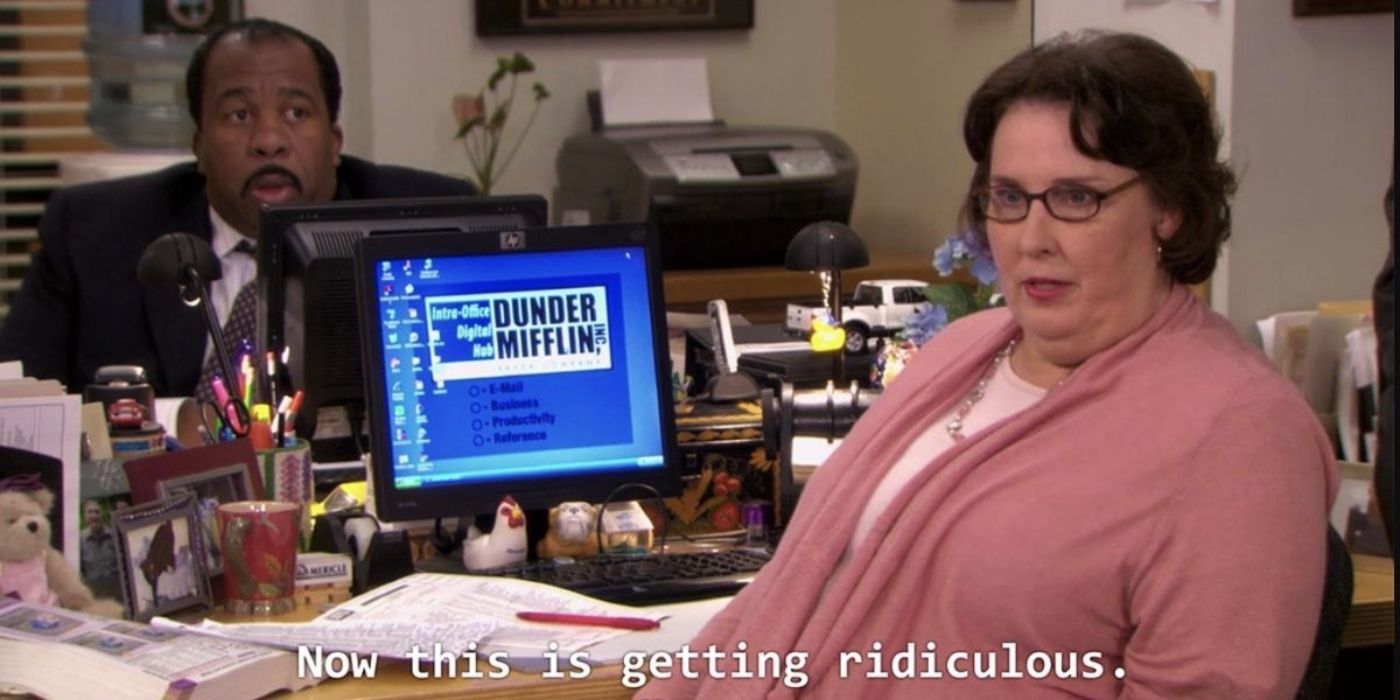 Stanley and Phyllis sitting together on The Office