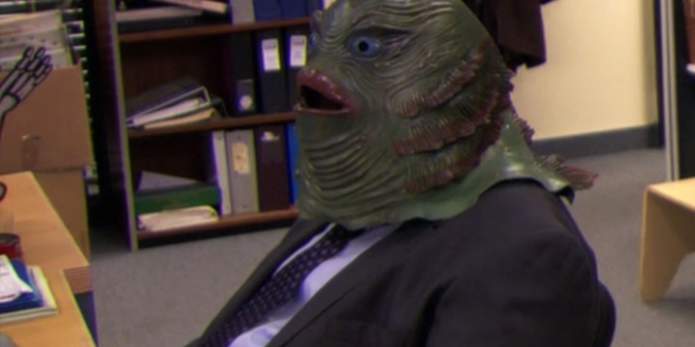 Stanley wearing a Halloween mask in The Office